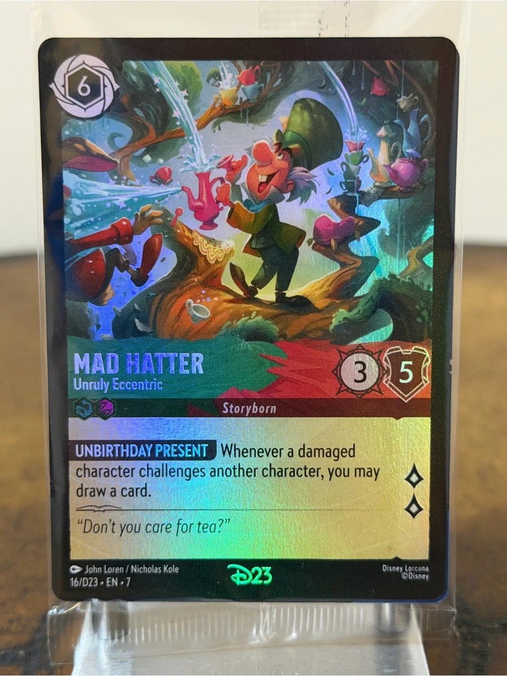 NEW SEALED IN PLASTIC D23 LORCANA MAD HATTER UNRULY ECCENTRIC PLAYING CARD